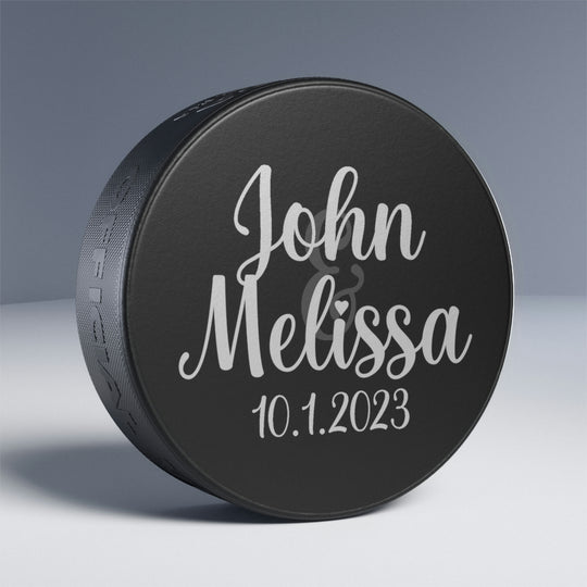 Favores de boda personalizados con disco de hockey
