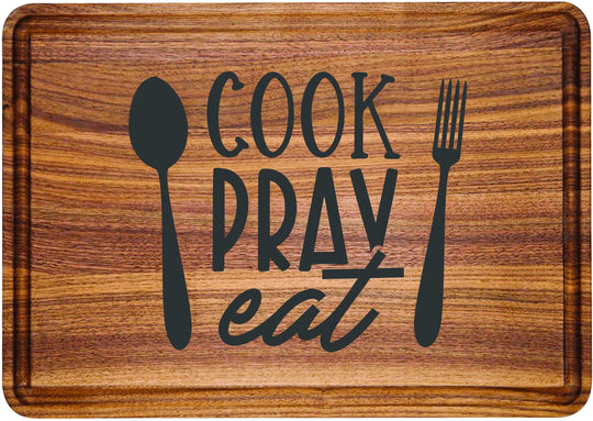 Custom engraved walnut wooden cutting board. Christmas gift presents walnut wood engraved custom cutting boards. Cook Pray Eat