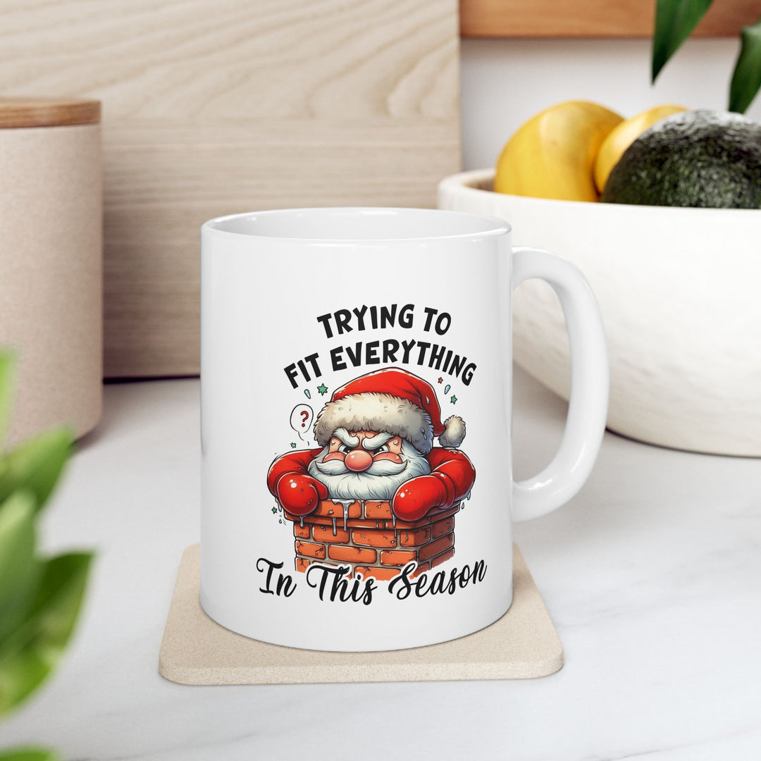 Funny Christmas Coffee Mug - Santa Quote "Trying to Fit Everything in This Season"