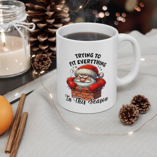 Funny Christmas Coffee Mug - Santa Quote "Trying to Fit Everything in This Season"