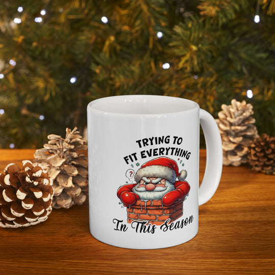 Funny Christmas Coffee Mug - Santa Quote "Trying to Fit Everything in This Season"