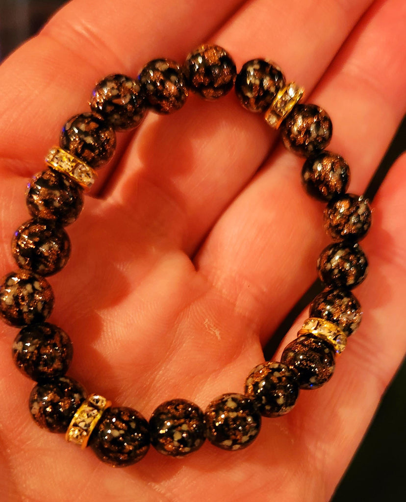 Celestial Glow Bracelet: Luminous Glass Beads with Gold  display picture 1